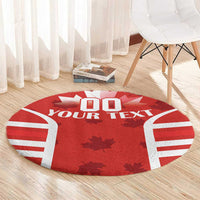 Red round rug with rugby jersey print, white stripes and maple leaves, custom text