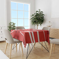 Red Canada flag tablecloth with striking white stripes, draped over dining table