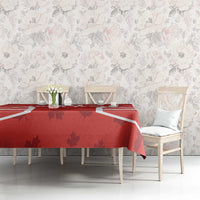 Red Canada flag tablecloth with maple leaf design and white stripe motif on table