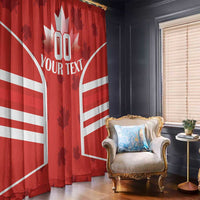 Red Canada flag window curtain with white maple leaf and custom text, hanging two-panel view