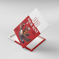 Framed red canvas wall art of bear riding a goose with custom text, angled view