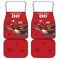 Flat layout of red custom car mats: two with beaver-on-goose art and two plain maple-leaf