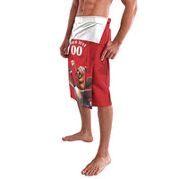 Red graphic swim trunks with white waistband, side view of cartoon patch print