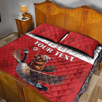 Red quilted bed set with two pillows, Canada-themed beaver-and-goose graphic on quilt