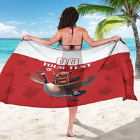 Red sarong with beaver riding goose artwork and customizable text area