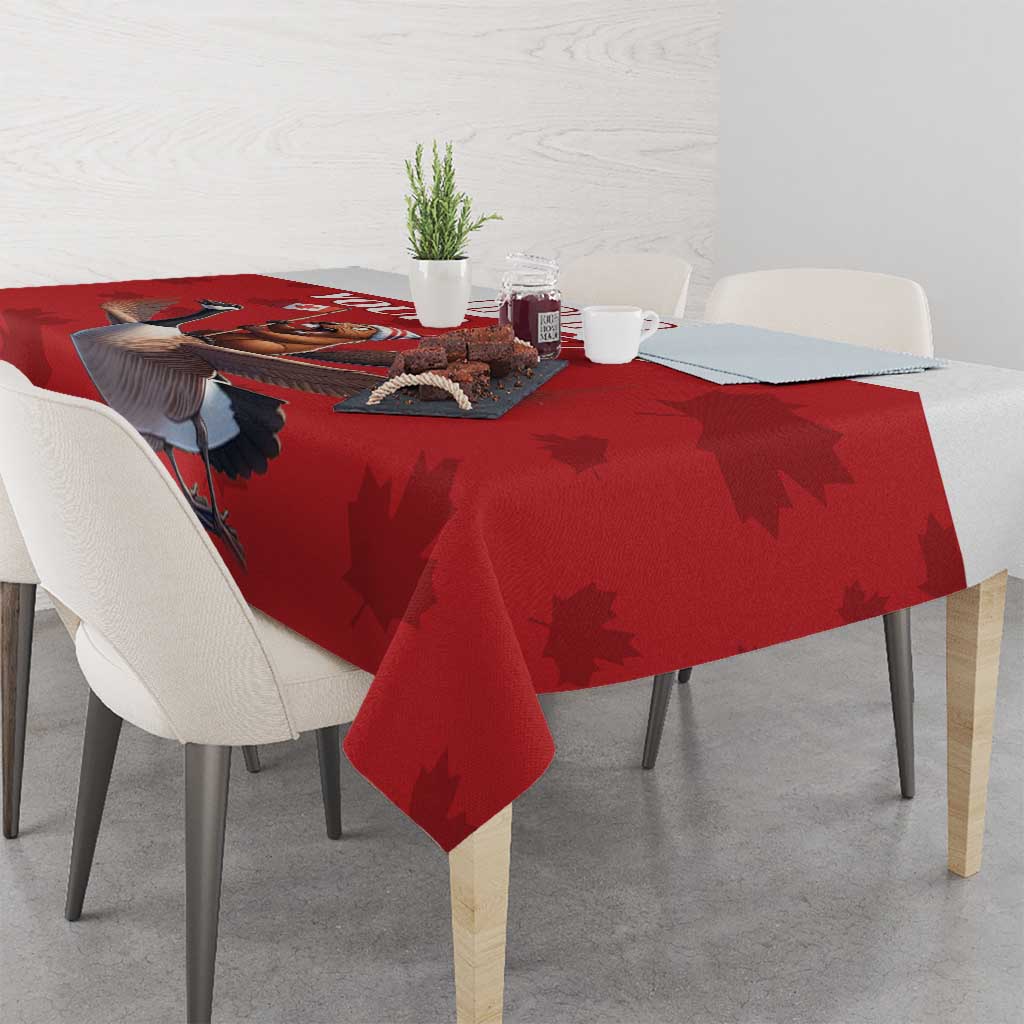 Red custom tablecloth with Canada-style goose and maple leaf pattern on table