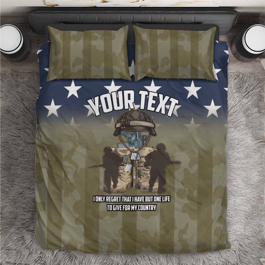Personalized bedding set with olive camouflage duvet, blue star border, “YOUR TEXT”