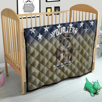 Personalized U.S. Veterans quilt on toddler bed with navy stars, tan diamonds, soldier graphic, “YOUR TEXT”