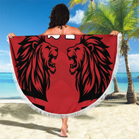 Round red beach blanket with black lion heads, white fringe, "YOUR TEXT 24" center