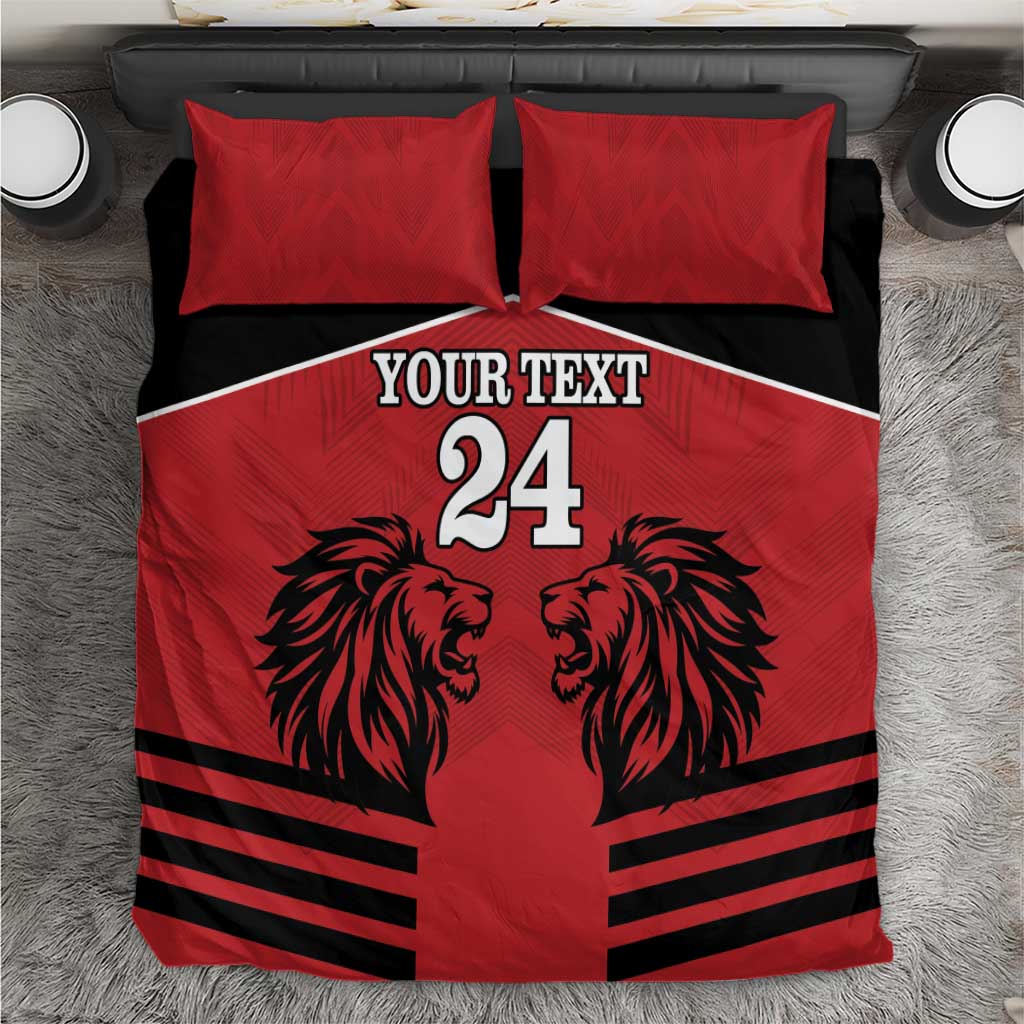 Red and black duvet bedding set with two red pillowcases, lion head graphic and stripes