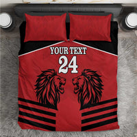 Red and black duvet bedding set with two red pillowcases, lion head graphic and stripes