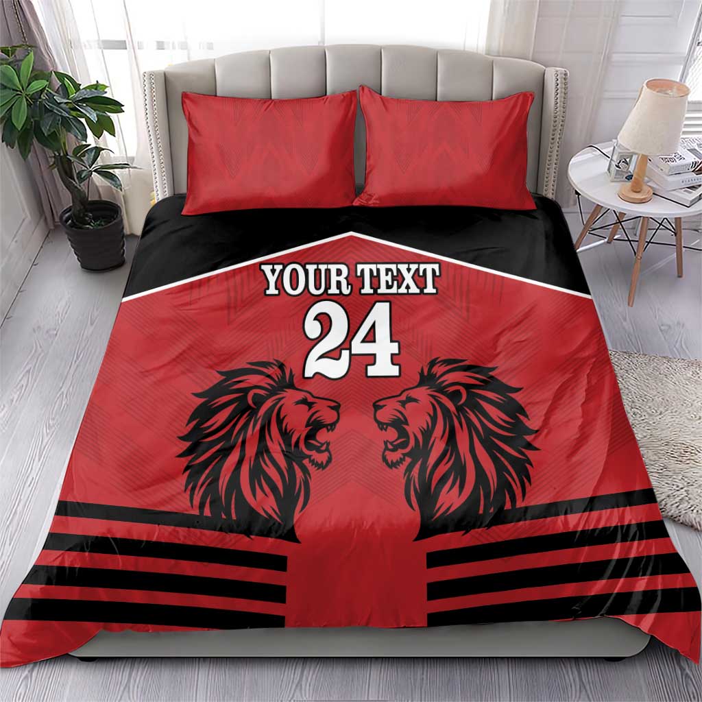 Red and black duvet bedding set with two red pillowcases, lion heads, stripes, and 'YOUR TEXT 24'
