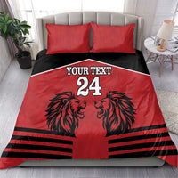 Red and black duvet bedding set with two red pillowcases, lion heads, stripes, and 'YOUR TEXT 24'