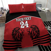 Red and black duvet bedding set with two red pillowcases, lion heads, stripes, and large 24