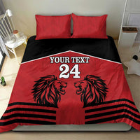 Red and black duvet bedding set with two red pillowcases, lion face graphic and black stripe bands
