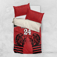 Red and black duvet bedding set with two red pillowcases, lion heads and horizontal stripe bars