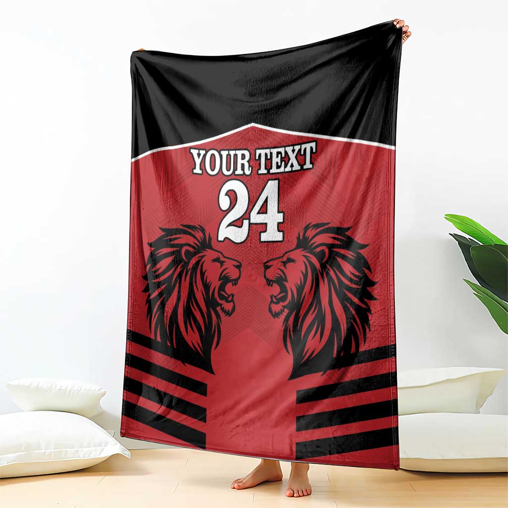 Red & black rugby blanket hanging, lion heads with 'Your Text' and number 24