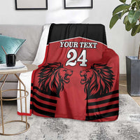 Red & black rugby blanket with lion heads, 'Your Text' and number 24 on floor