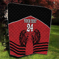 Red and black quilt blanket with lion design, 'YOUR TEXT' and number 24, folded view.