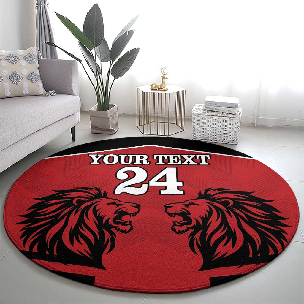 Red round rug with black lion faces and 'YOUR TEXT 24' graphic, bold circular shape