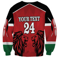 Red rugby sweatshirt back with customizable text 'YOUR TEXT 24' and lion head graphic