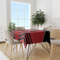 Red tablecloth with black diagonal stripe rugby pattern