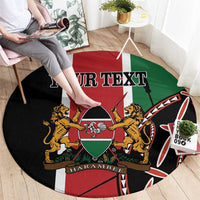 Round carpet on floor with red and green flag design, lions, and Kenya emblem