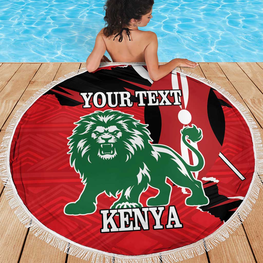 Red round beach blanket with lion and Kenya emblem, fringe edge, 'YOUR TEXT' over shoulders