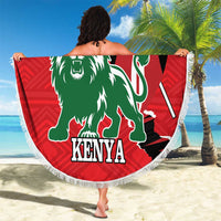 Red round beach blanket with lion and Kenya logo, fringe border, held outdoors