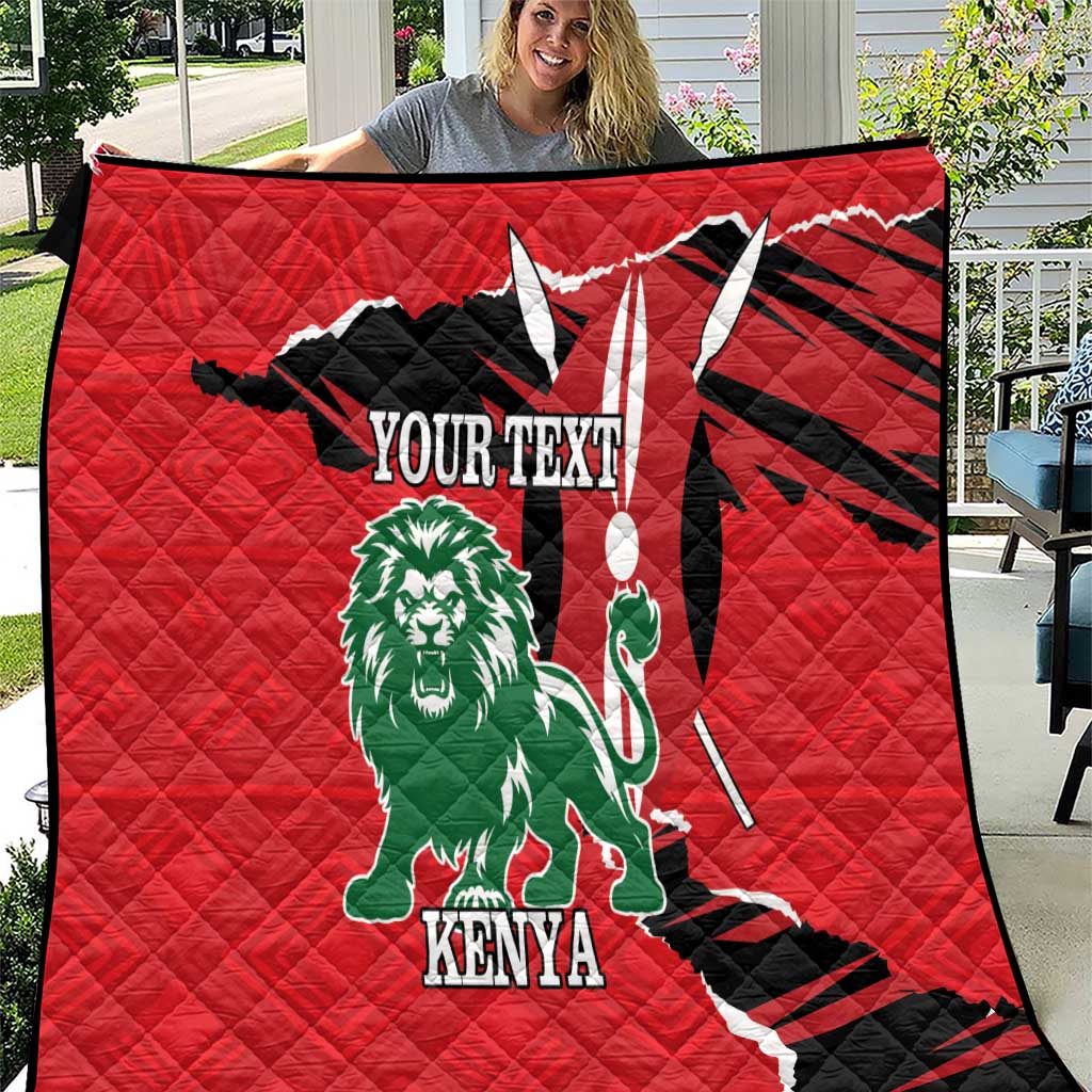 Red quilt with black-and-white Kenya map, green lion, and “YOUR TEXT” graphic