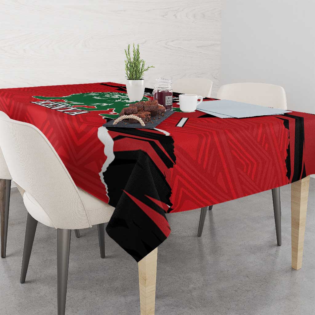 Red tablecloth with black lion silhouette and Kenya text on table