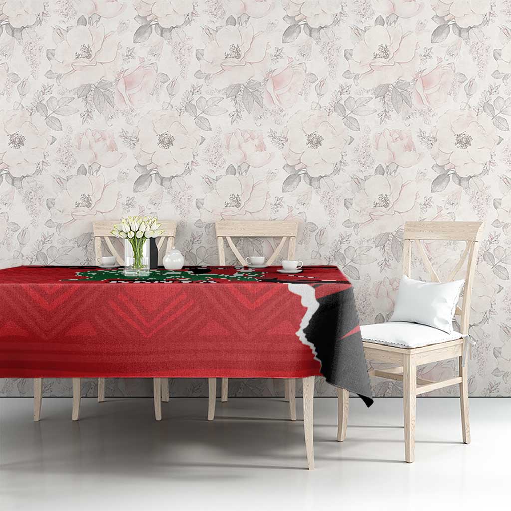 Red Kenya Independence tablecloth with lion graphic on dining table