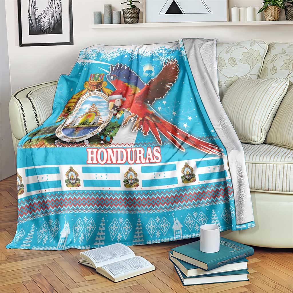 Honduras Christmas blanket in bright blue with macaw, Santa, and festive patterned border