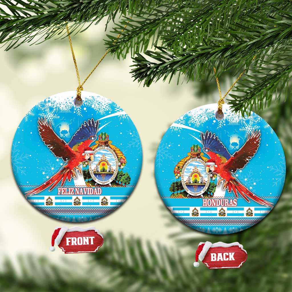 Two blue ceramic round ornaments with scarlet macaw, Feliz Navidad and Honduras text.