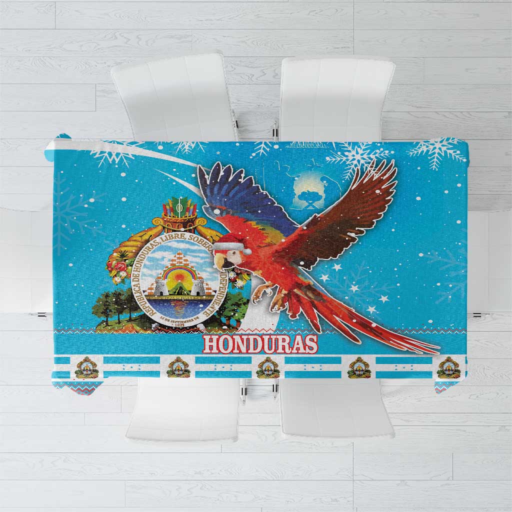 Blue Christmas tablecloth with macaw, Honduras crest, and Feliz Navidad