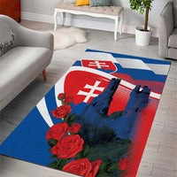 Blue area rug, castle and Slovak flag with red roses on white border