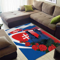 Blue area rug with castle silhouette, Slovak flag crest and red roses on white border