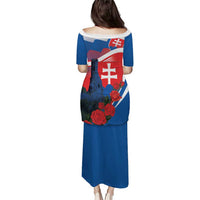 Blue long dress, back view, with red rose and Slovak flag graphic
