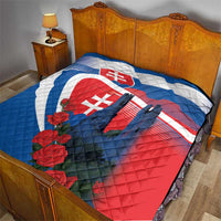 Bedroom quilt with Slovakia flag design, castle silhouettes, and red roses on bed