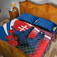 Quilt bed set with Slovak flag graphic, roses, and castle silhouette; blue quilted pillows