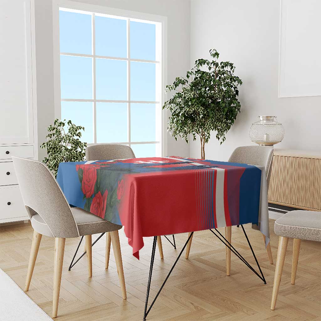 Printed blue red white tablecloth draped over dining table