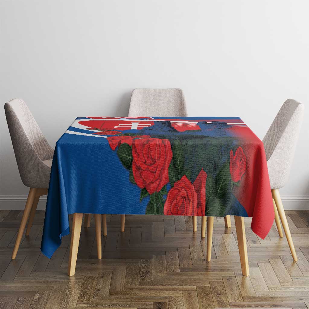 Blue red white tablecloth with roses and castle design on dining table