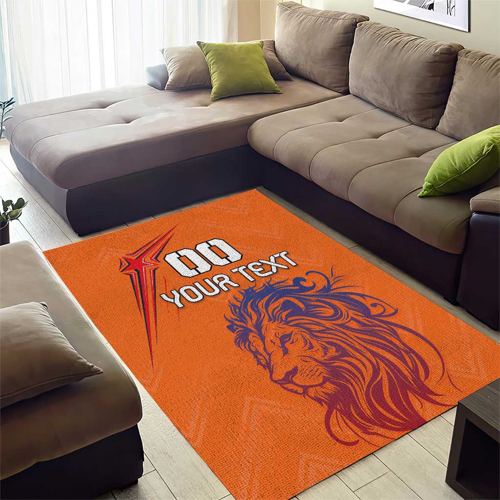 Orange lion graphic area rug with 'YOUR TEXT' text and star icon