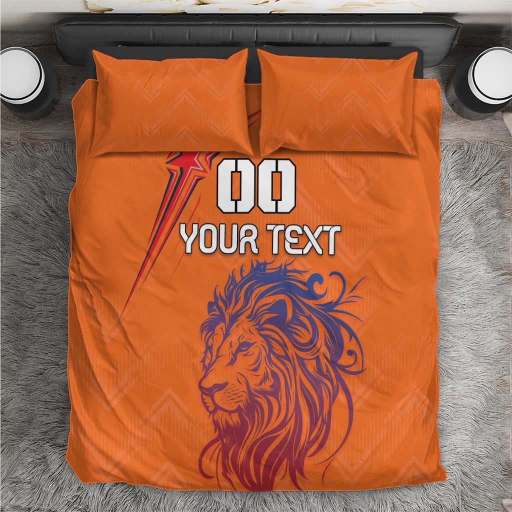 Orange bedding set featuring lion face and 'DO YOUR TEXT' text on duvet