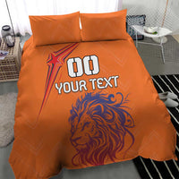 Orange lion bedding set showing 'DO YOUR TEXT' on duvet with two pillowcases