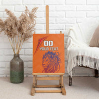 Orange canvas wall art with lion graphic and custom number text, leaning on easel