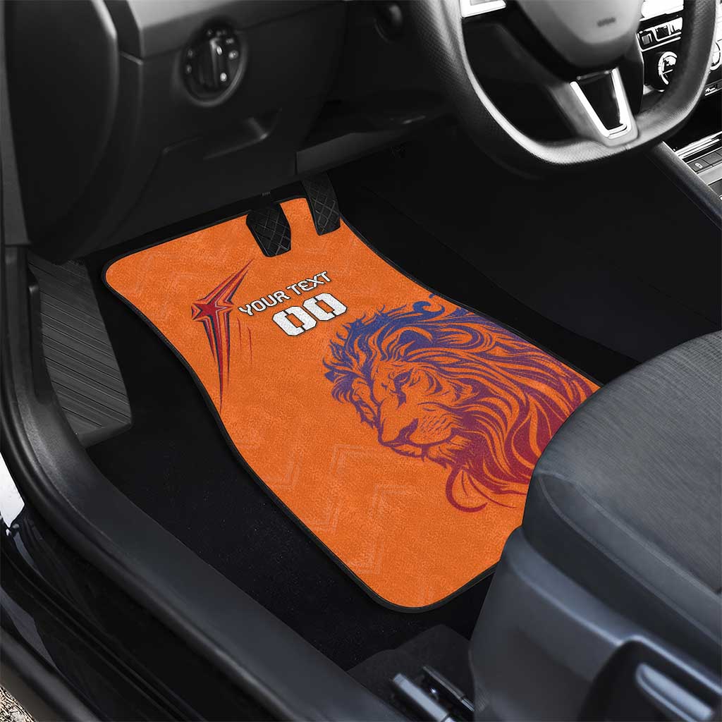 Orange car floor mat with lion graphic and "YOUR TEXT" for the front seat area