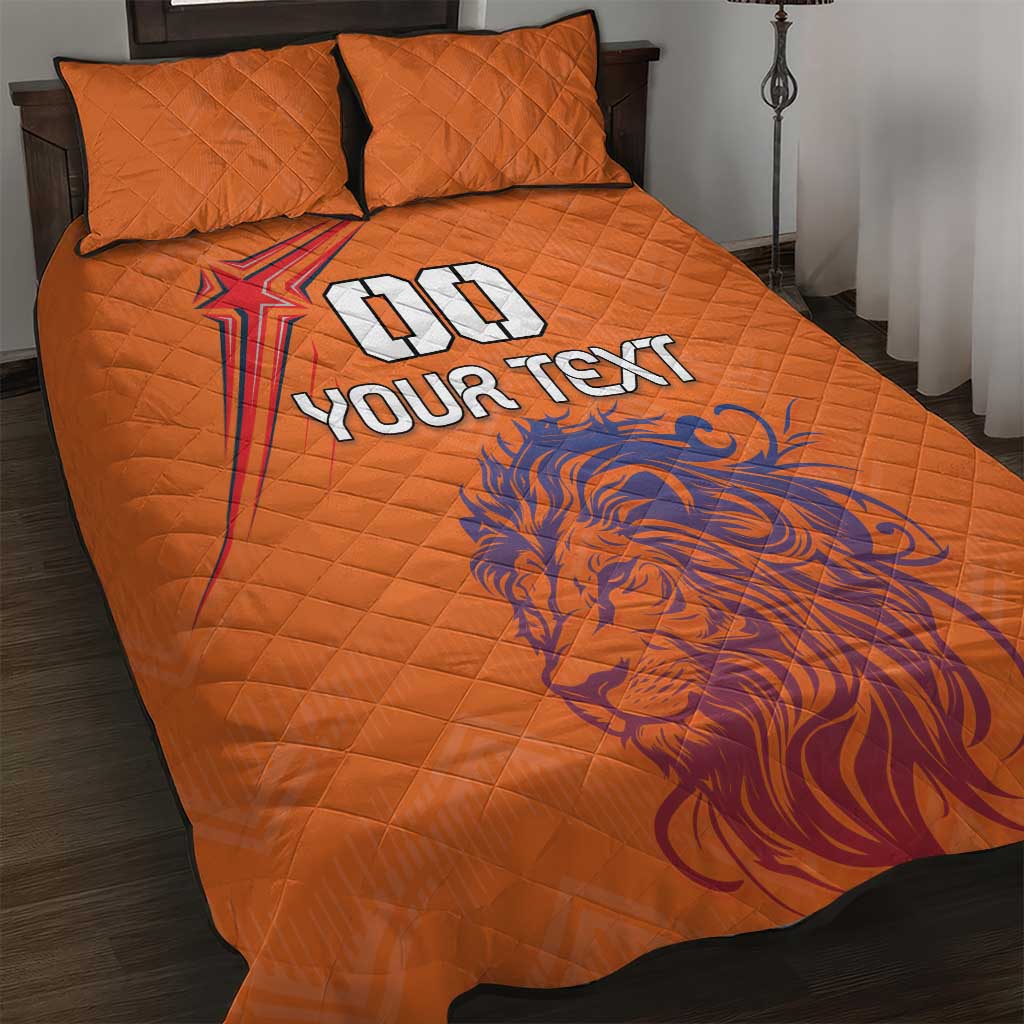 Orange quilt bed set with lion graphic and “YOUR TEXT”, plus two matching pillows