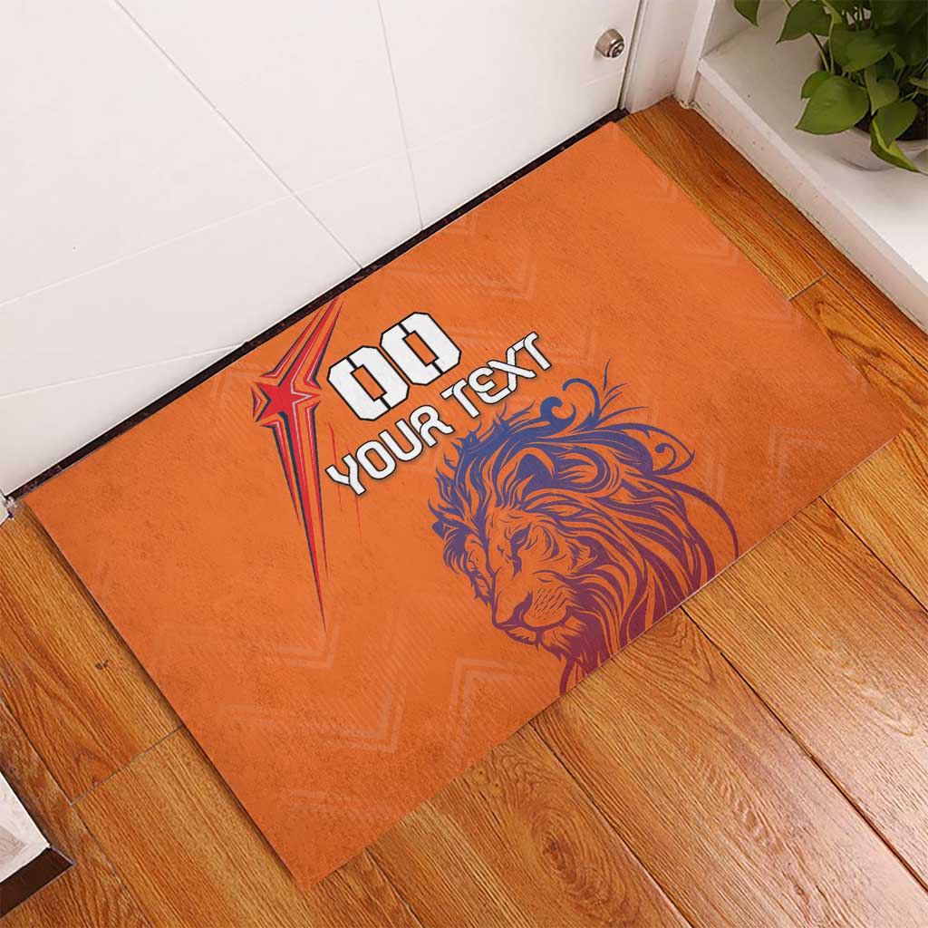 Orange rubber doormat with lion artwork and "GO YOUR TEXT" text