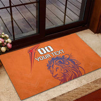 Orange rubber doormat featuring lion graphic and "GO YOUR TEXT" wording